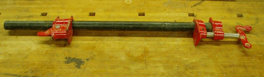 Professional plumbing fittings and brass supply lines organized on a clean work surface inside a service van